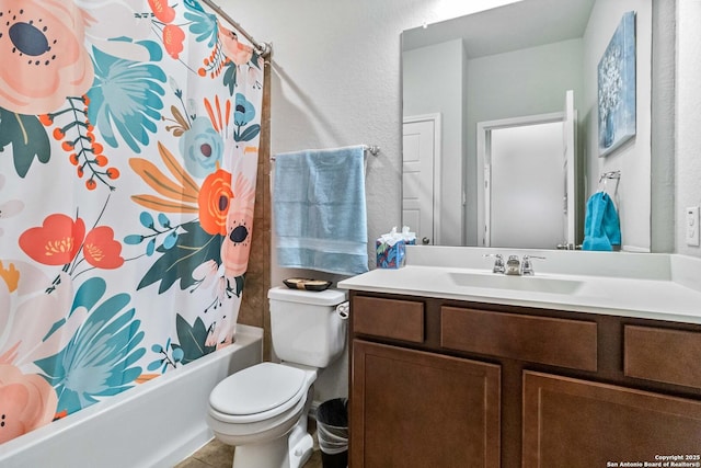 full bathroom featuring vanity, toilet, and shower / bathtub combination with curtain