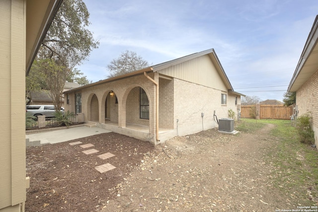 view of property exterior featuring central AC