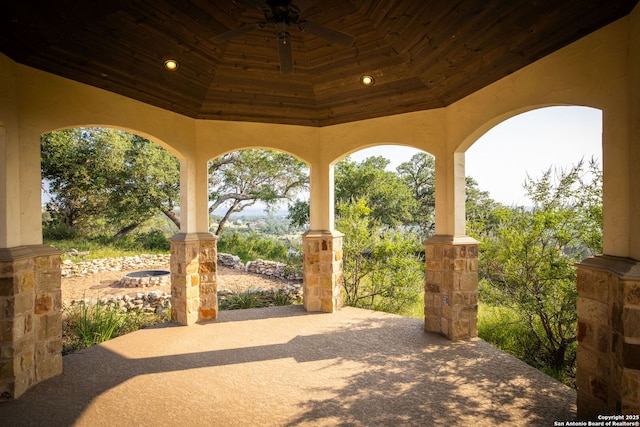 view of patio / terrace featuring a gazebo and ceiling fan