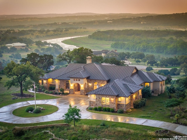 view of aerial view at dusk