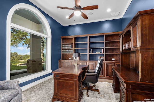 office space with ceiling fan and ornamental molding