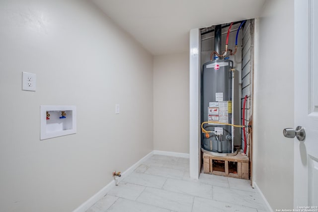 utility room featuring gas water heater