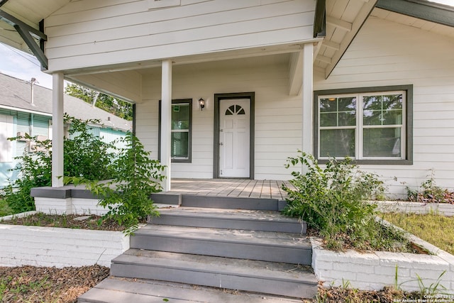 entrance to property with a porch