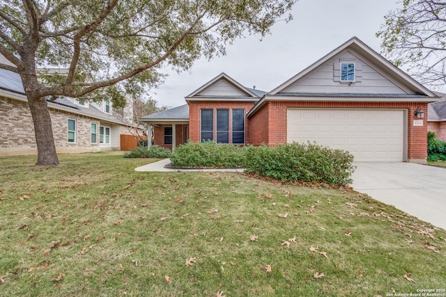 view of front of house featuring a garage and a front yard