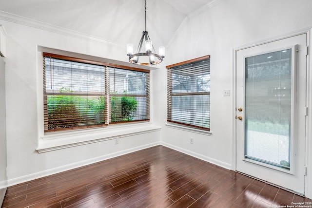 unfurnished dining area with a chandelier and ornamental molding