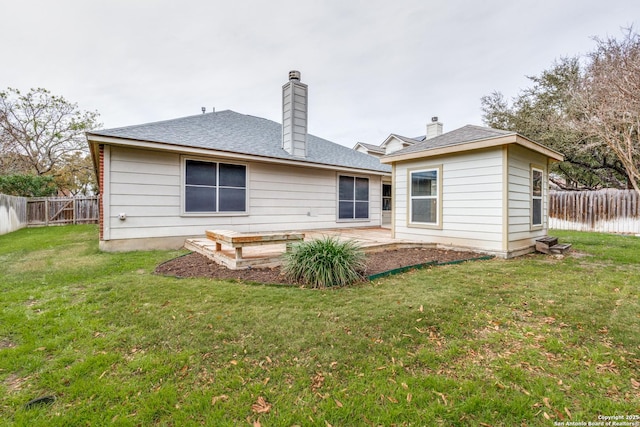 back of property featuring a yard and a patio