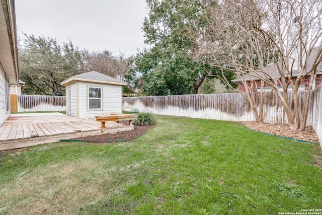 view of yard with a wooden deck