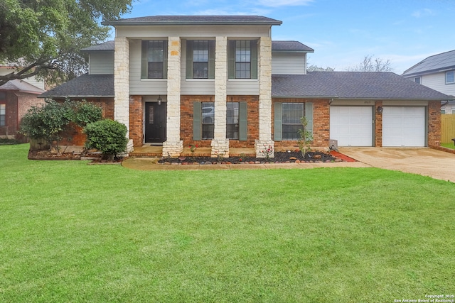 view of front of property with a garage and a front lawn