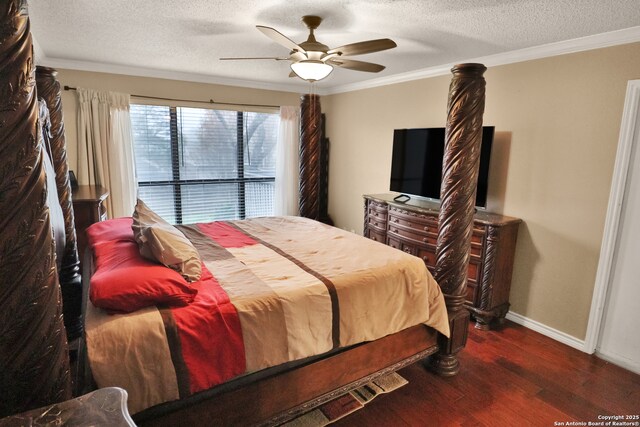 bedroom featuring a textured ceiling, dark hardwood / wood-style flooring, ceiling fan, and crown molding