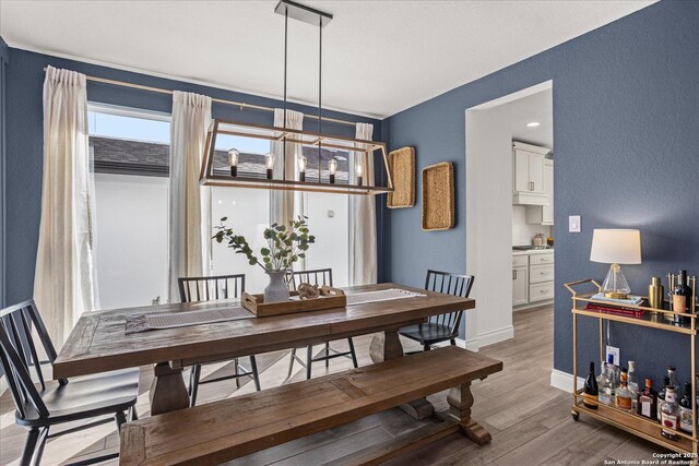 dining room with light wood-type flooring