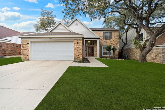 view of front of house with a garage, a front lawn, and central AC unit