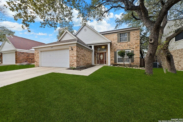 view of front of house featuring a garage, a front lawn, and central air condition unit