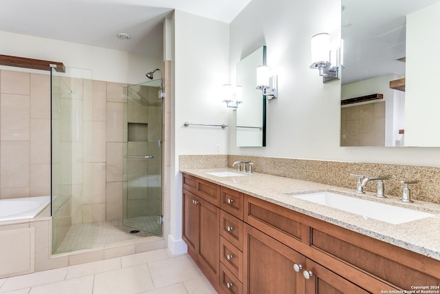 bathroom with vanity, separate shower and tub, and tile patterned floors