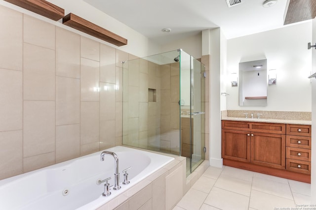 bathroom with tile patterned floors, plus walk in shower, and vanity