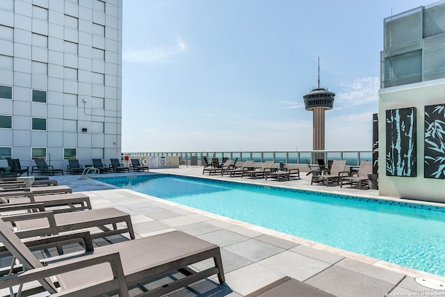 view of swimming pool with a patio