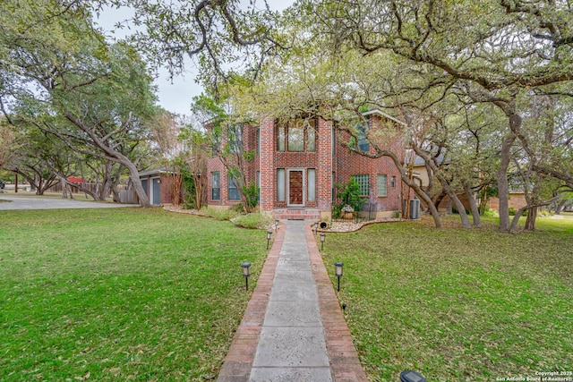 view of front of house with a front lawn