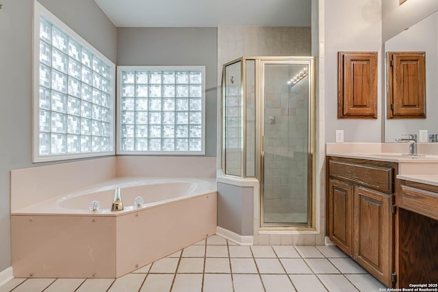 bathroom featuring separate shower and tub, tile patterned floors, and vanity