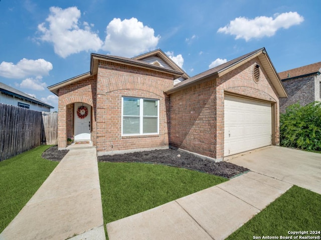 single story home featuring a front lawn