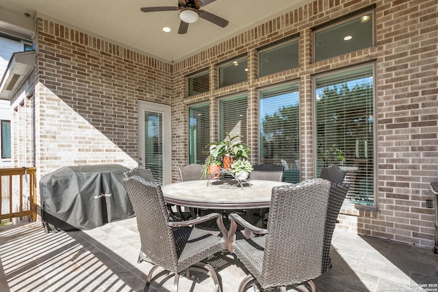 view of patio / terrace with ceiling fan and grilling area