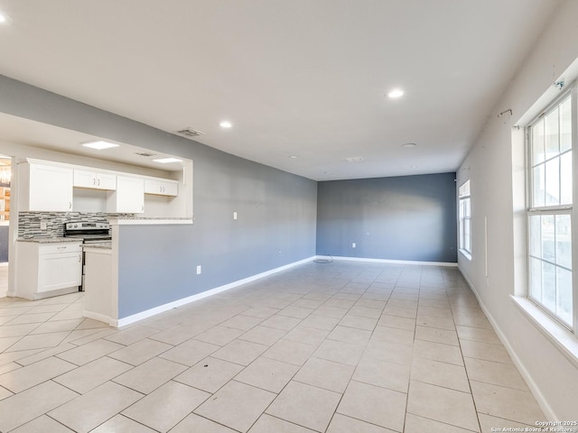 interior space with light tile patterned floors