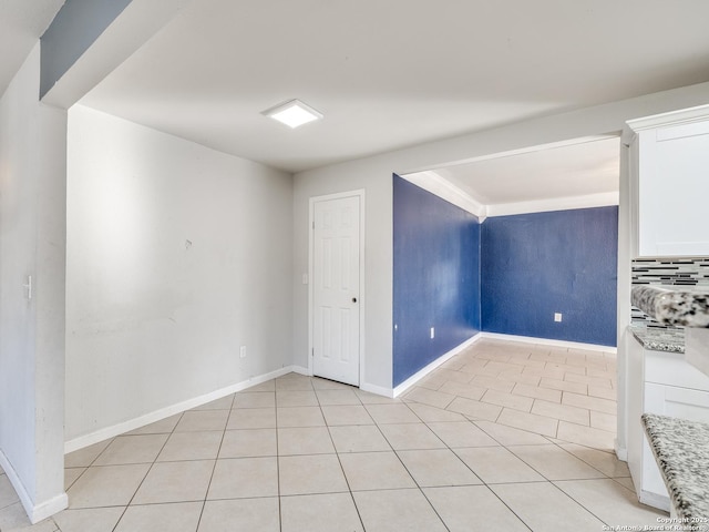 interior space featuring light tile patterned floors