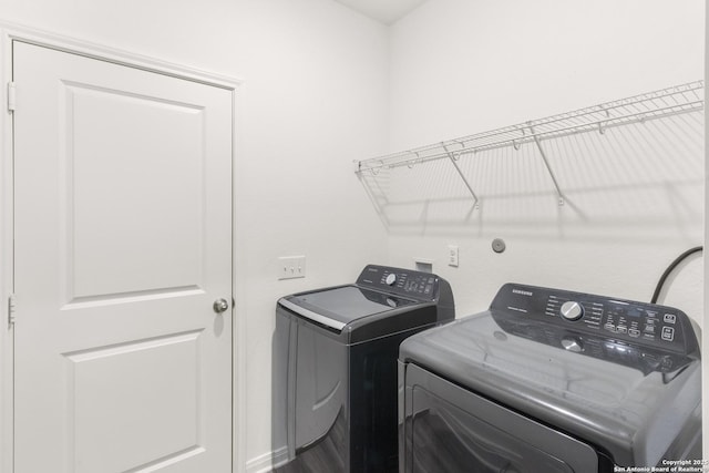 washroom with washer and clothes dryer