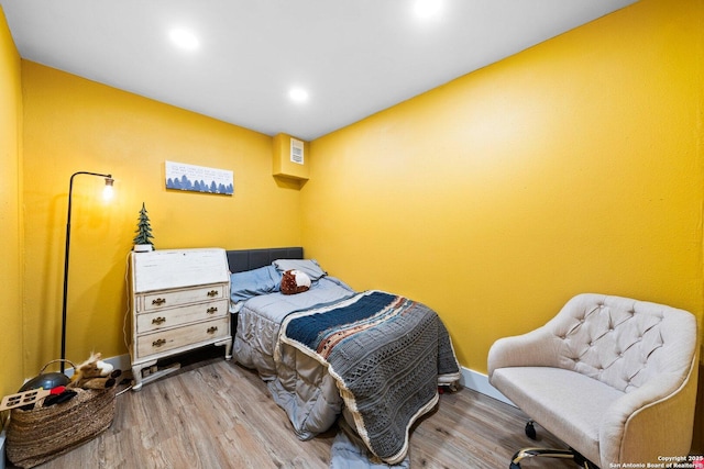 bedroom featuring light hardwood / wood-style flooring