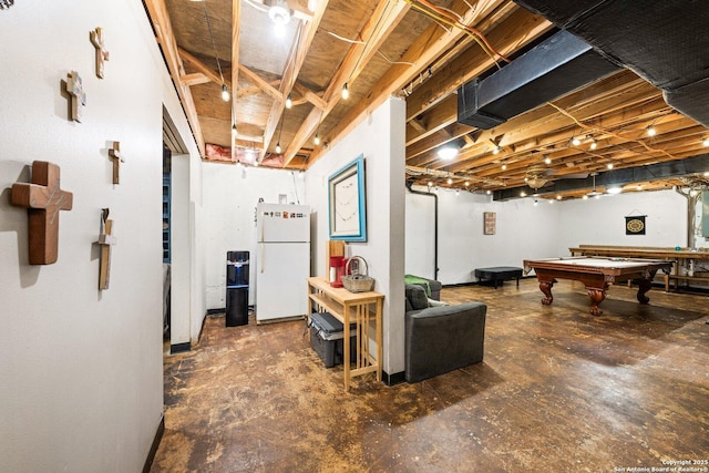 basement featuring white fridge and pool table