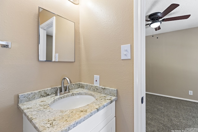 bathroom featuring vanity and ceiling fan