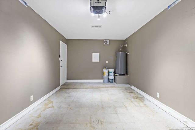 garage with a garage door opener and water heater