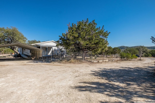 view of yard featuring a carport