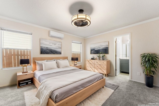 bedroom featuring a wall unit AC, ensuite bathroom, light colored carpet, and ornamental molding