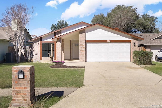 ranch-style house with central AC, a front yard, and a garage