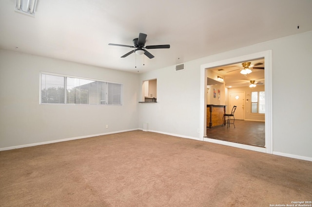 spare room featuring carpet floors