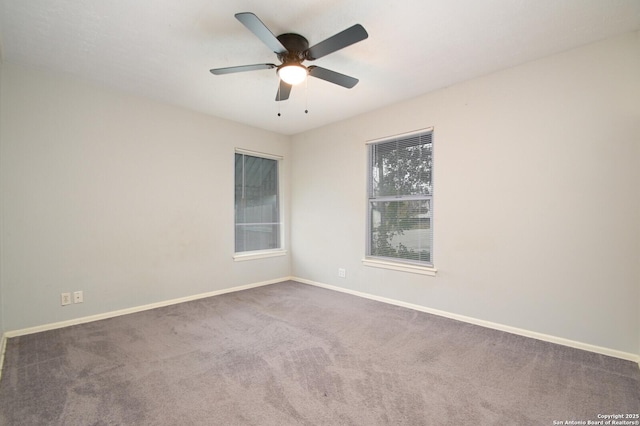 unfurnished room featuring carpet flooring and ceiling fan