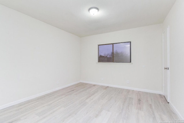 empty room featuring light hardwood / wood-style floors