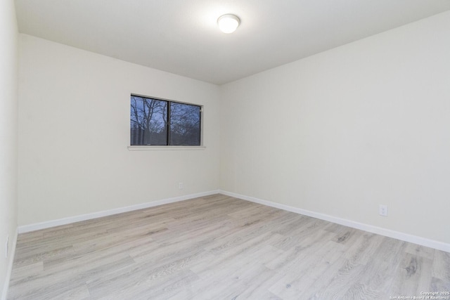 unfurnished room featuring light wood-type flooring