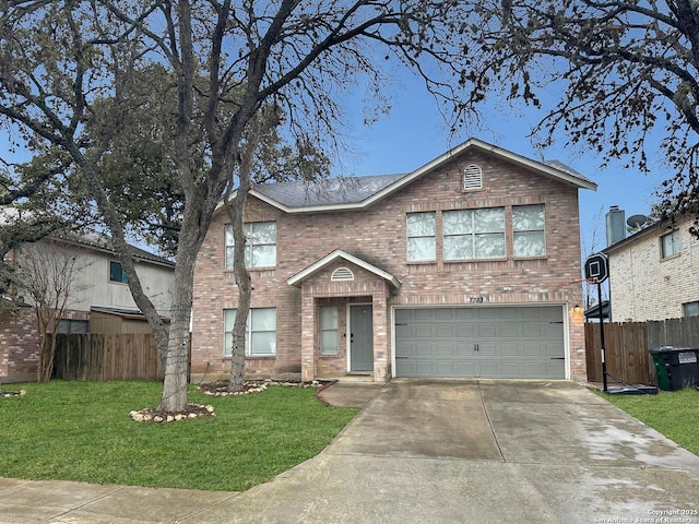 view of front facade with a garage and a front lawn