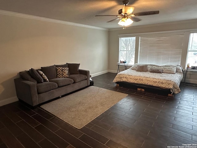 bedroom featuring dark wood-type flooring, ceiling fan, and ornamental molding