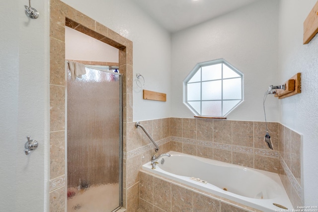 bathroom featuring plus walk in shower