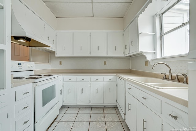 kitchen with white cabinetry, sink, white appliances, light tile patterned floors, and custom exhaust hood