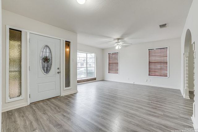 entryway with light hardwood / wood-style floors and ceiling fan