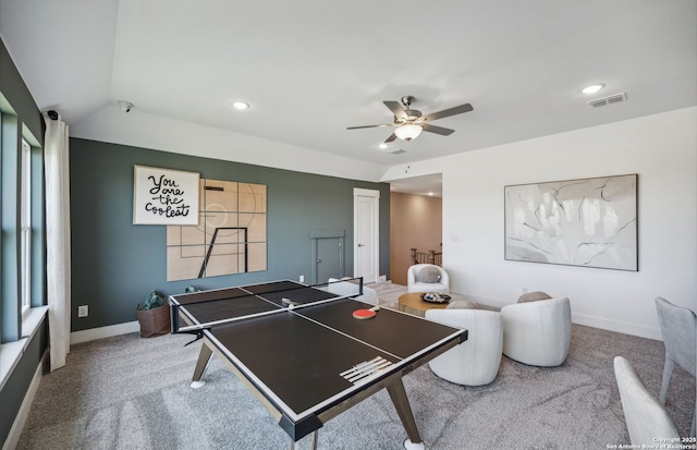 playroom featuring ceiling fan, carpet floors, and lofted ceiling