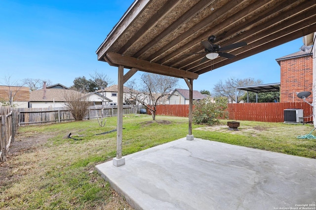 view of yard featuring central air condition unit, a patio area, and ceiling fan