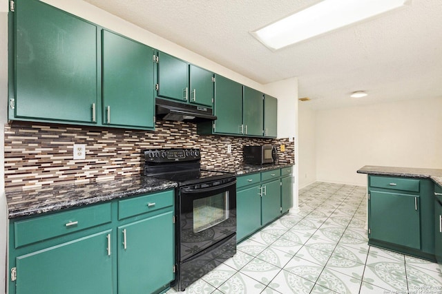 kitchen featuring green cabinetry, dark stone countertops, and black appliances