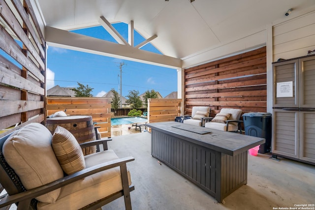 view of patio featuring an outdoor living space and a fenced in pool