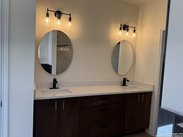 bathroom with a sink and double vanity