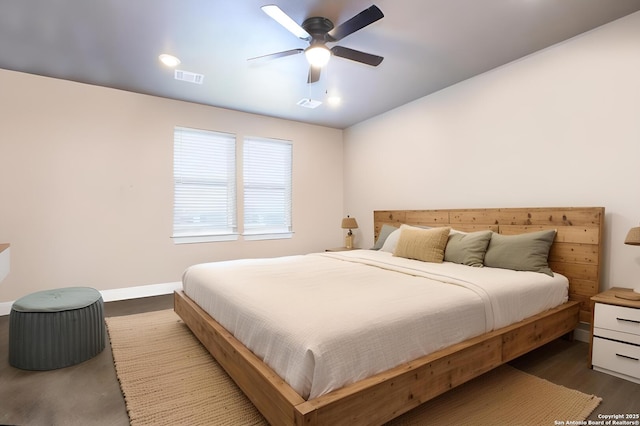 bedroom featuring ceiling fan and hardwood / wood-style floors