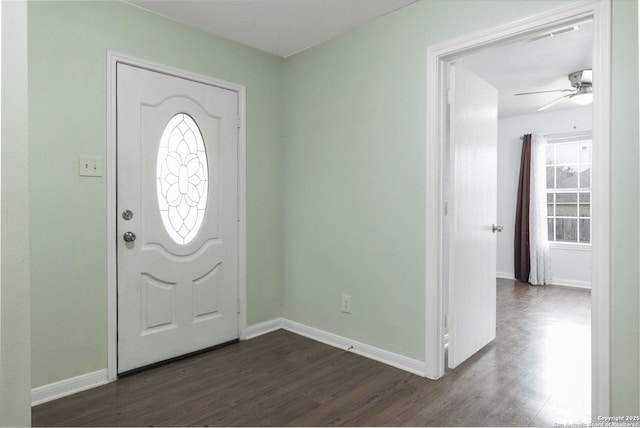 foyer with ceiling fan, dark wood-type flooring, and a healthy amount of sunlight