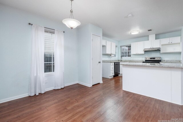 kitchen featuring a wealth of natural light, pendant lighting, dishwasher, white cabinetry, and stainless steel electric range